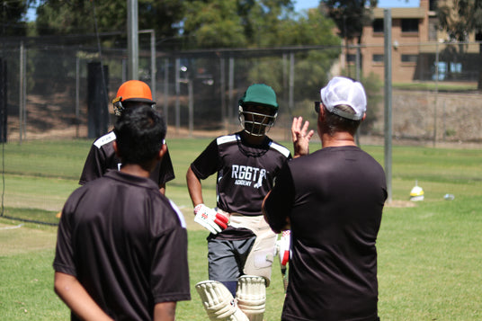 Cricket players being coached by Shaun Seigert