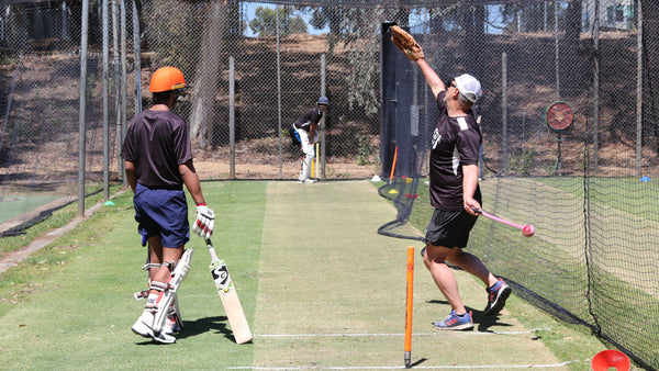 High Performance Cricketer, on the left, and batter, in the middle, and Shaun Seigert, on the right, all training together